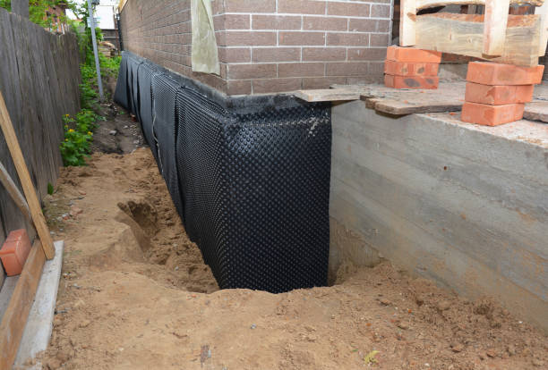 Happy homeowners after waterproofing job in Ocean Grove